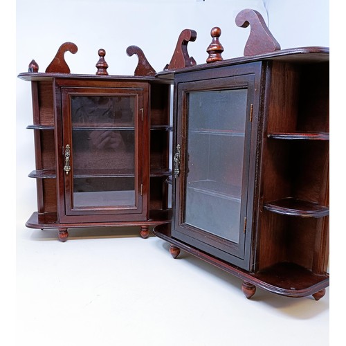 585 - A pair of mahogany wall shelves, a quantity of handbags and purses, and assorted other items (qty)