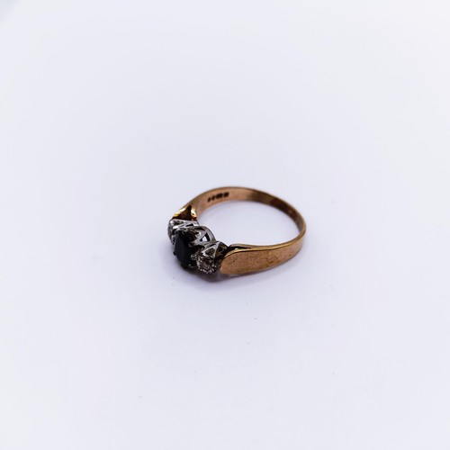 135A - A 9ct gold, sapphire and diamond ring, ring size Q