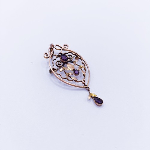 137A - A 9ct gold and amethyst pendant