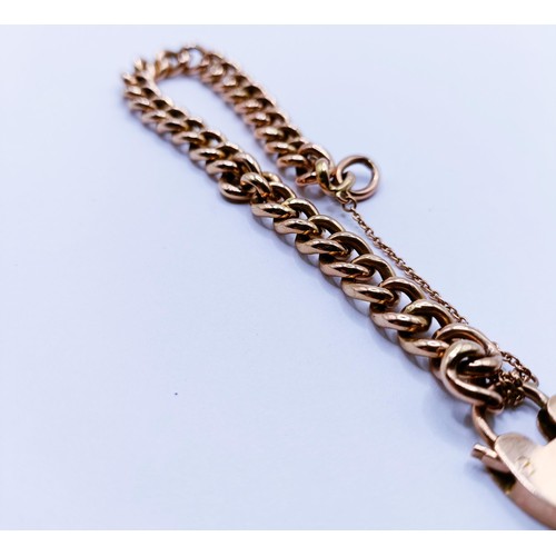 146A - A 9ct gold bracelet with a heart shaped padlock clasp, 13 g