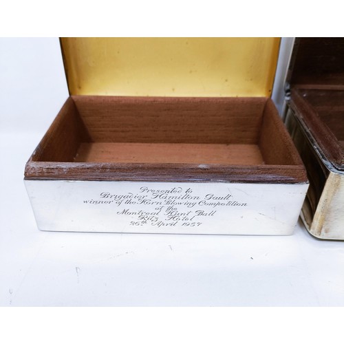 418 - A George V silver cigarette box, and a silver coloured metal cigarette box (2)