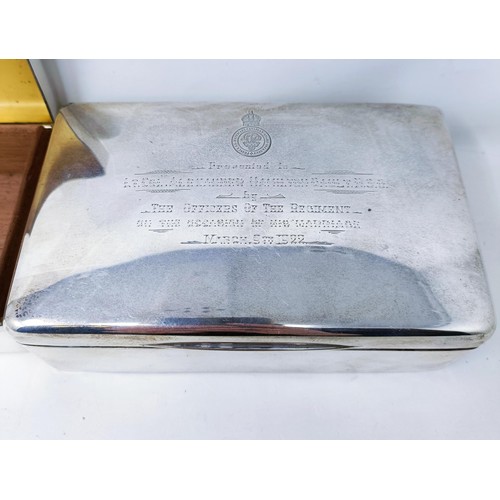 418 - A George V silver cigarette box, and a silver coloured metal cigarette box (2)