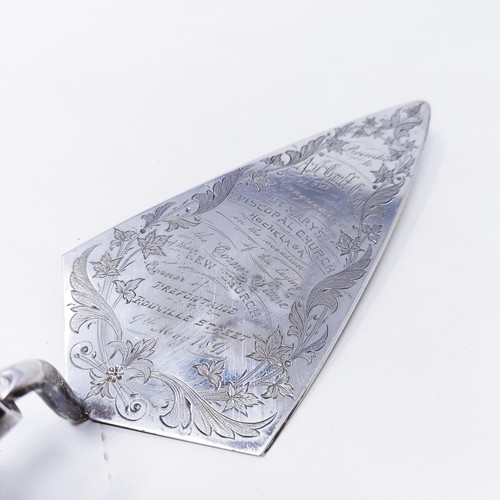 420 - A sterling silver commemorative trowel with an ebonised handle