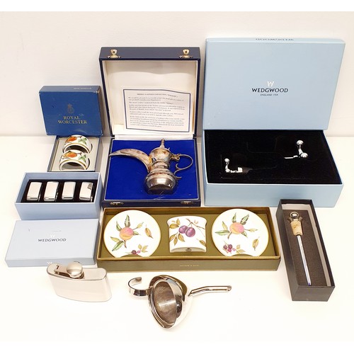 274 - An Eastern silver coloured metal coffee pot, cased, a Wedgwood silver plated corkscrew and stopper, ... 