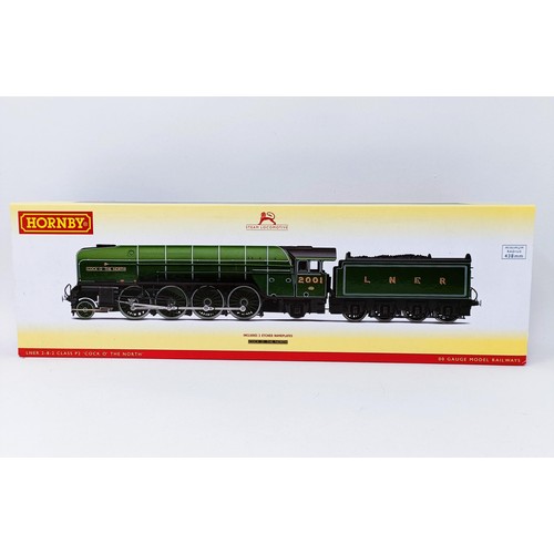 52 - A Hornby OO gauge 2-8-2 locomotive and tender, No R3207
Provenance: Deceased single owner collection... 