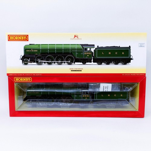 52 - A Hornby OO gauge 2-8-2 locomotive and tender, No R3207
Provenance: Deceased single owner collection... 