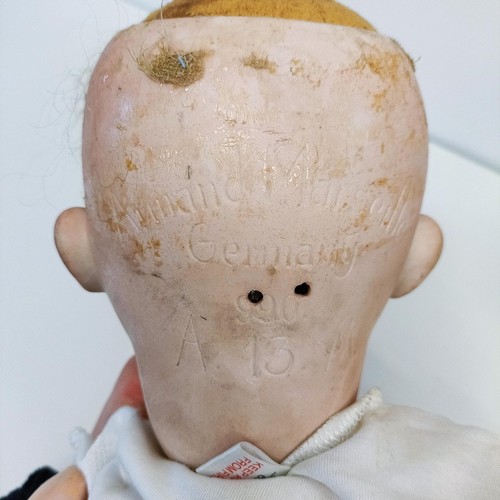 63 - An Armand Marseille German bisque head doll, with composite body and millefiori glass eyes, lacking ... 