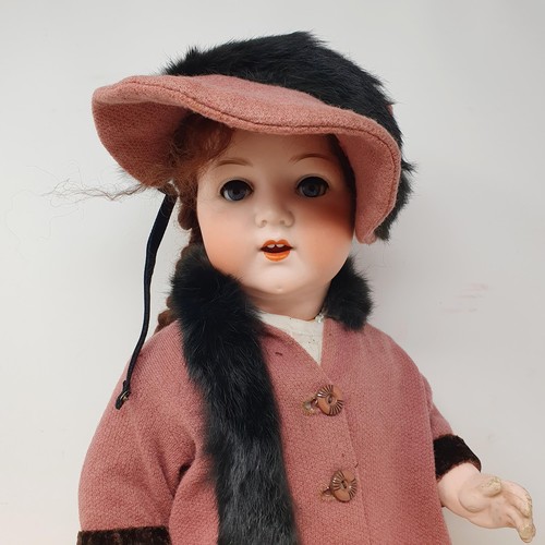 75 - An Armand Marseille, German bisque headed doll, 995.A.9.M, another doll, and a small assortment of d... 