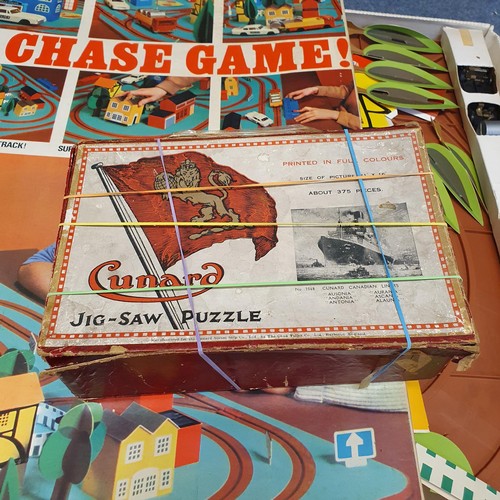 78 - A Cunard jigsaw puzzle, boxed, a Bandit Chase board game, assorted portable sewing machines, toys, a... 