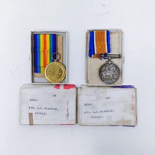 157 - A British War Medal and Victory Medal pair, awarded to 22962 Pte S J Blackman, Wilts Reg, with boxes... 