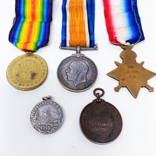 155 - A WWI Trio, with 1914-15 Star, awarded to Gnr J Lund RN, KIA 30th December 1915, with a silver medal... 