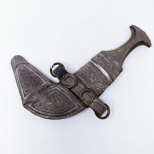 161 - A jambiya, with a horn handle and silver coloured metal mounts, 31 cm high overall