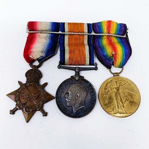 163 - A 1914-15 Star Trio, awarded to 2219 Pte P Whitley, Manchester Reg