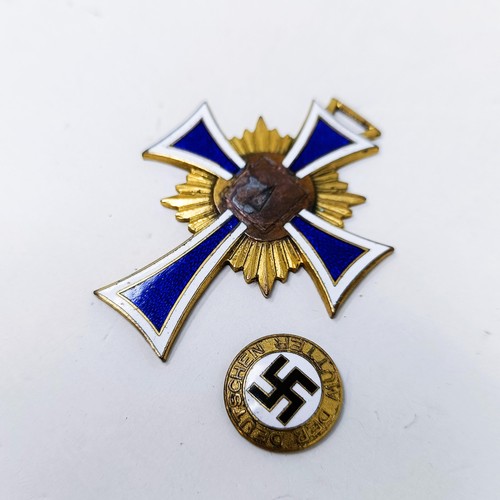 168 - A Third Reich mother's cross, centre enamel swastika detached but present