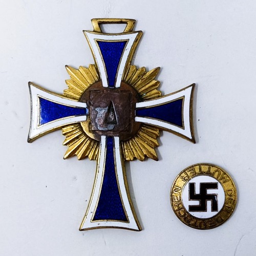 168 - A Third Reich mother's cross, centre enamel swastika detached but present