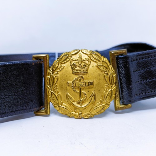 171 - A QVR Gieves Limited Royal Navy sword belt, and a photograph of the transport ship Dongola, signed b... 