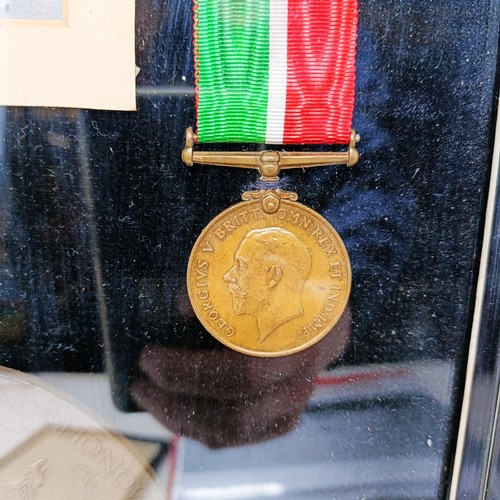 176 - A pair of medals awarded to Henry Harding Ruston, comprising a British War Medal and a Mercantile Ma... 