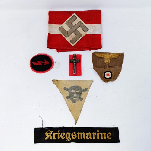 139 - A German Third Reich armband, a Mine Field warning pennant, a Kriegsmarine cap band and other items ... 