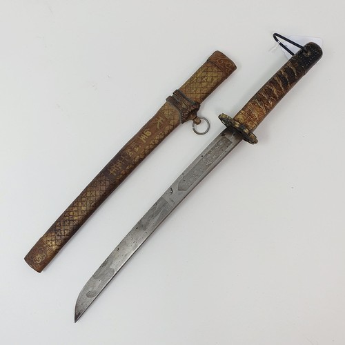 190 - A Japanese Tanto, the 27 cm blade with characters, having a single molded handle, in a scabbard, 45 ... 