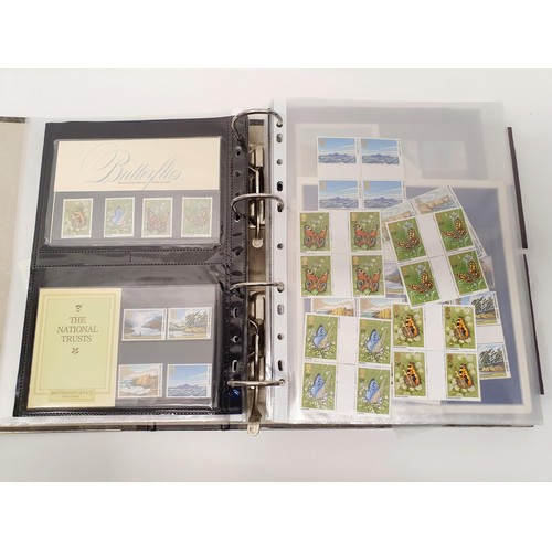 318 - Assorted Royal Mail presentation packs, other commemorative stamps and items, in a file