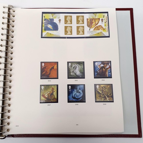 331 - An album of Royal Mail commemorative stamps, Prestige booklets and other items