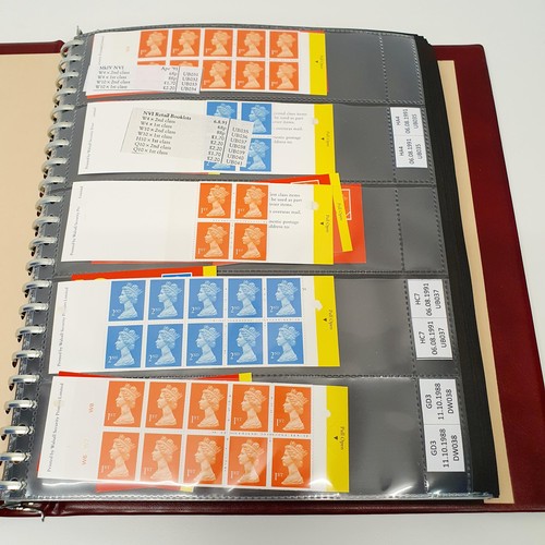 344 - An album of Royal Mail stamp booklets