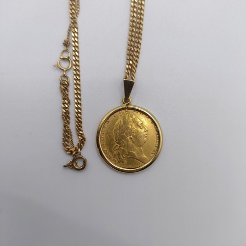 224 - A George III gold spade guinea, 1791, in an 18ct mount and chain