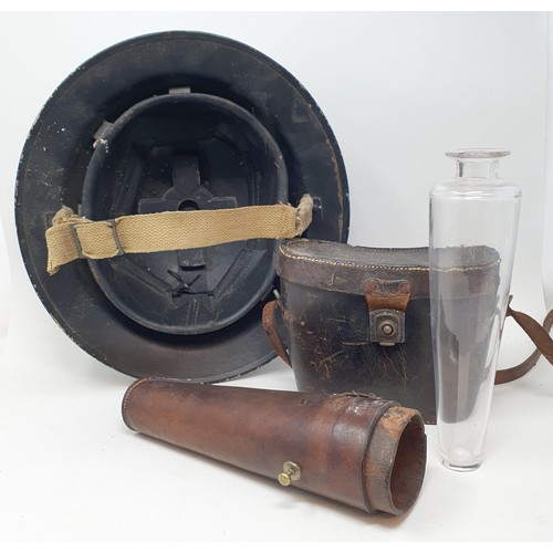 179 - A WWII Warden's helmet, a pair of Goerz field glasses, cased, and other items (box)