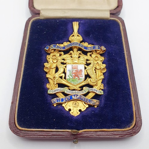 128 - On instructions of the family - The Smith Family Medals and Items: An 18ct gold and enamel Deputy La... 