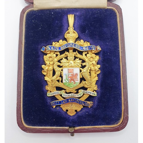 128 - On instructions of the family - The Smith Family Medals and Items: An 18ct gold and enamel Deputy La... 