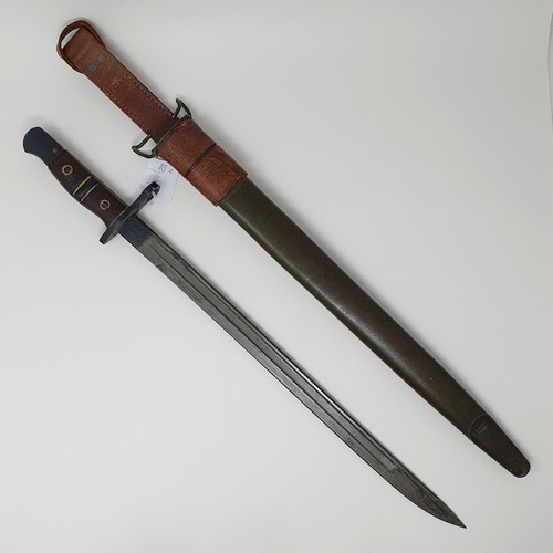 188 - A US Remington bayonet, dated 1917, with scabbard and leather hanger