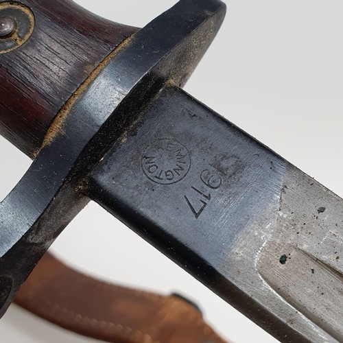 188 - A US Remington bayonet, dated 1917, with scabbard and leather hanger