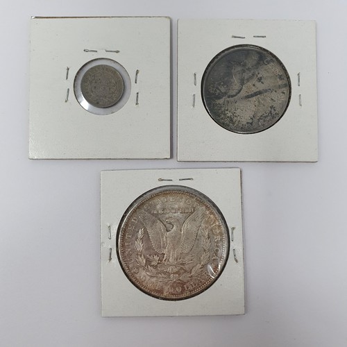 243 - A USA Morgan $1, 1904 (O), a 50c, 1923 (S), and a Seated half dime, 1854 (3)