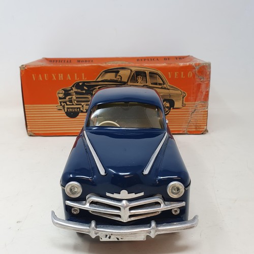 71 - An electric model of a Vauxhall Velox (boxed) and an Outlaw miniature antique firearm set (boxed) (2... 