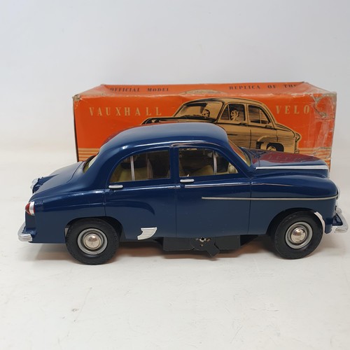 71 - An electric model of a Vauxhall Velox (boxed) and an Outlaw miniature antique firearm set (boxed) (2... 