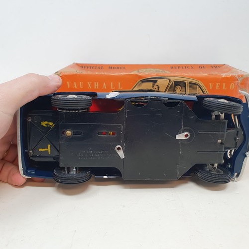 71 - An electric model of a Vauxhall Velox (boxed) and an Outlaw miniature antique firearm set (boxed) (2... 