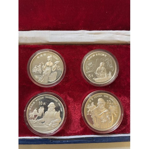 219 - Four Chinese silver coins in box, two 5f 1989 and two 10f 1990, cased