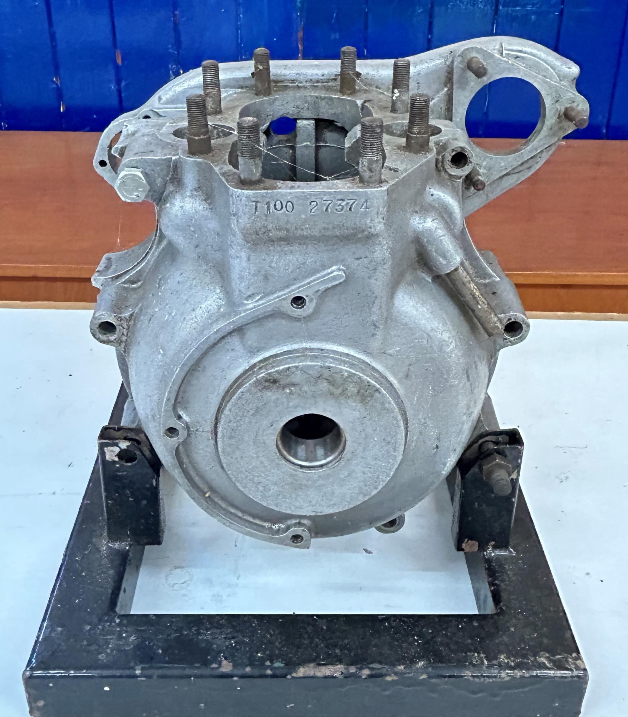 A Triumph T100 motorcycle engine casing, stamped T100 27374