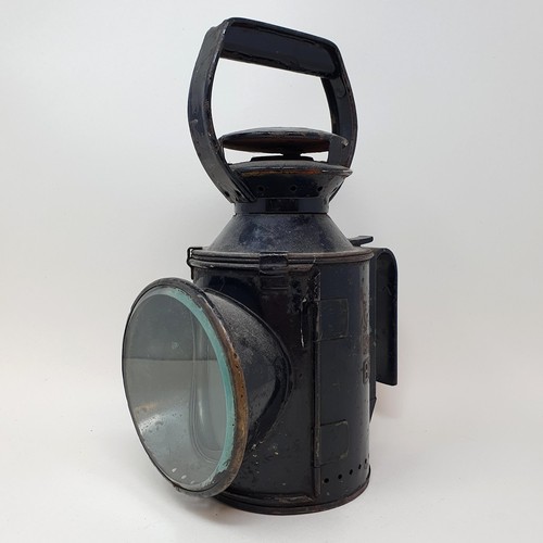 41 - A British Railway signalman's lantern, 30 cm high, and another similar (2)