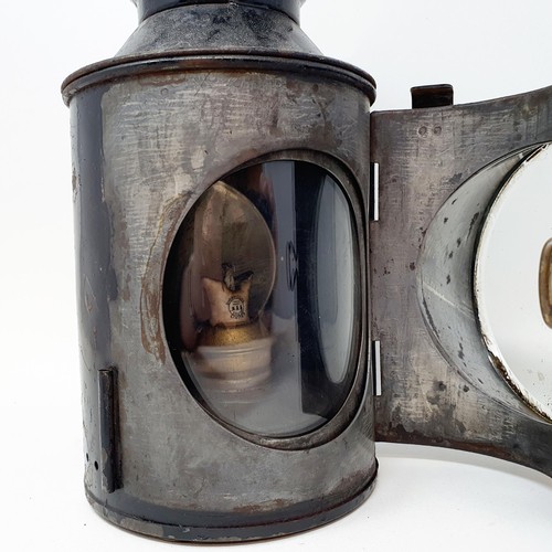 41 - A British Railway signalman's lantern, 30 cm high, and another similar (2)