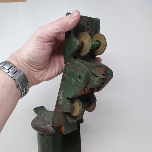 50 - A Waterlow type ticket punch, 26 cm high, and two iron railway rivets (3)