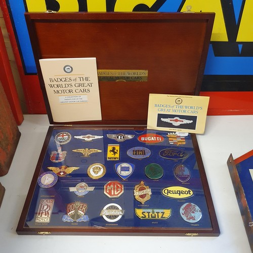 143 - A Danbury Mint display set of Badges of the World's Great Motor Cars, comprising twenty five motor c... 