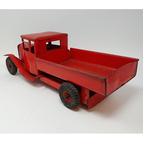 29 - A Tri-Ang red dump truck