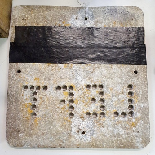 17 - An early aluminium Keep Left sign, lacking paint and most of the reflectors, 33 x 30 cm