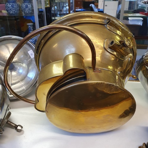 19 - An early 20th century large Willocq Bottin acetylene brass headlamp, with a copper handle, stamped 9... 