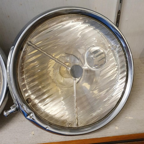 71 - A pair of Lucas chrome electric headlamps, 31 cm diameter