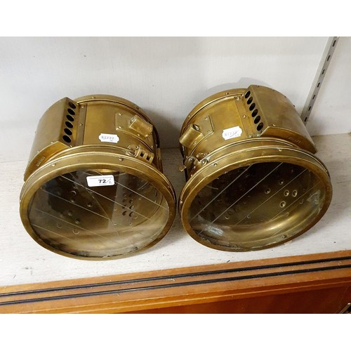 72 - A pair of Rushmore brass acetylene headlamps, one lens cracked, 25 cm diameter (2)