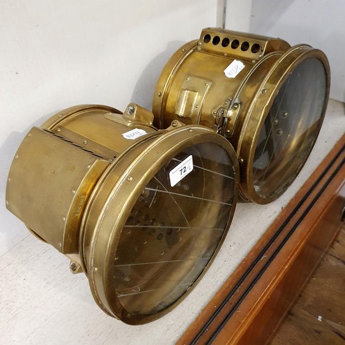 72 - A pair of Rushmore brass acetylene headlamps, one lens cracked, 25 cm diameter (2)