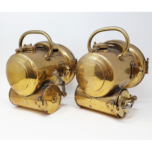 145 - A pair of early 20th century Powell & Hammer brass acetylene headlamps, 25 cm high