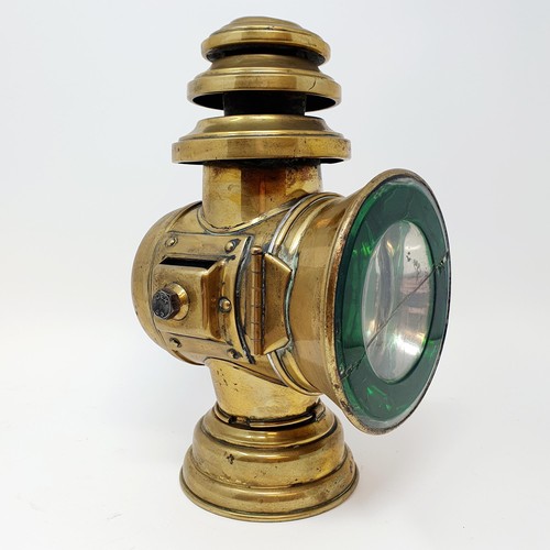 89 - An early 20th century Rubis, Brussels, brass oil sidelamp, lens cracked, 25.5 cm high